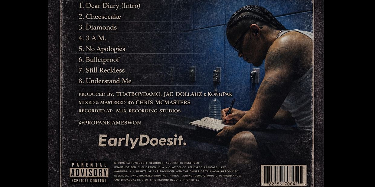 Hip-hop artist writing in a notebook with album tracklist beside him.