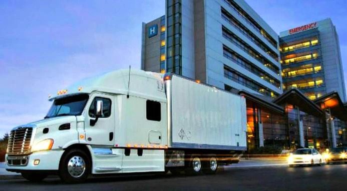 Straight truck in front of the hospital