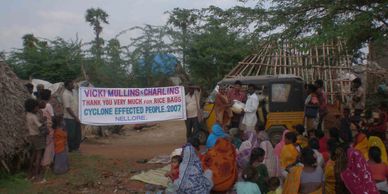 Delivery of humanitarian aid to cyclone affected villagers in India Sunshine After Rain Ministries