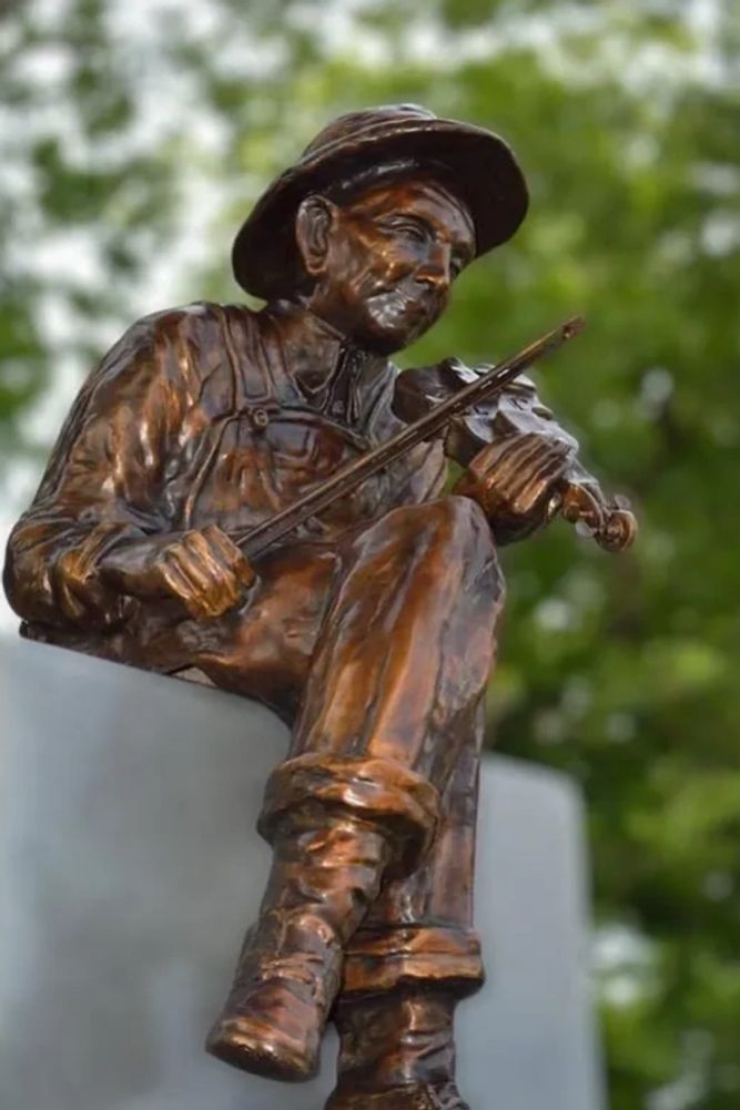 Athens Old Fiddler Statue