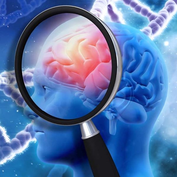A magnifying glass highlights a red and inflamed part of a brain.