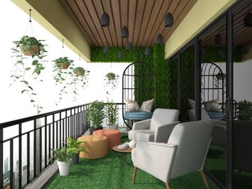 Modern balcony with hanging plants, cozy seating, and green decor.