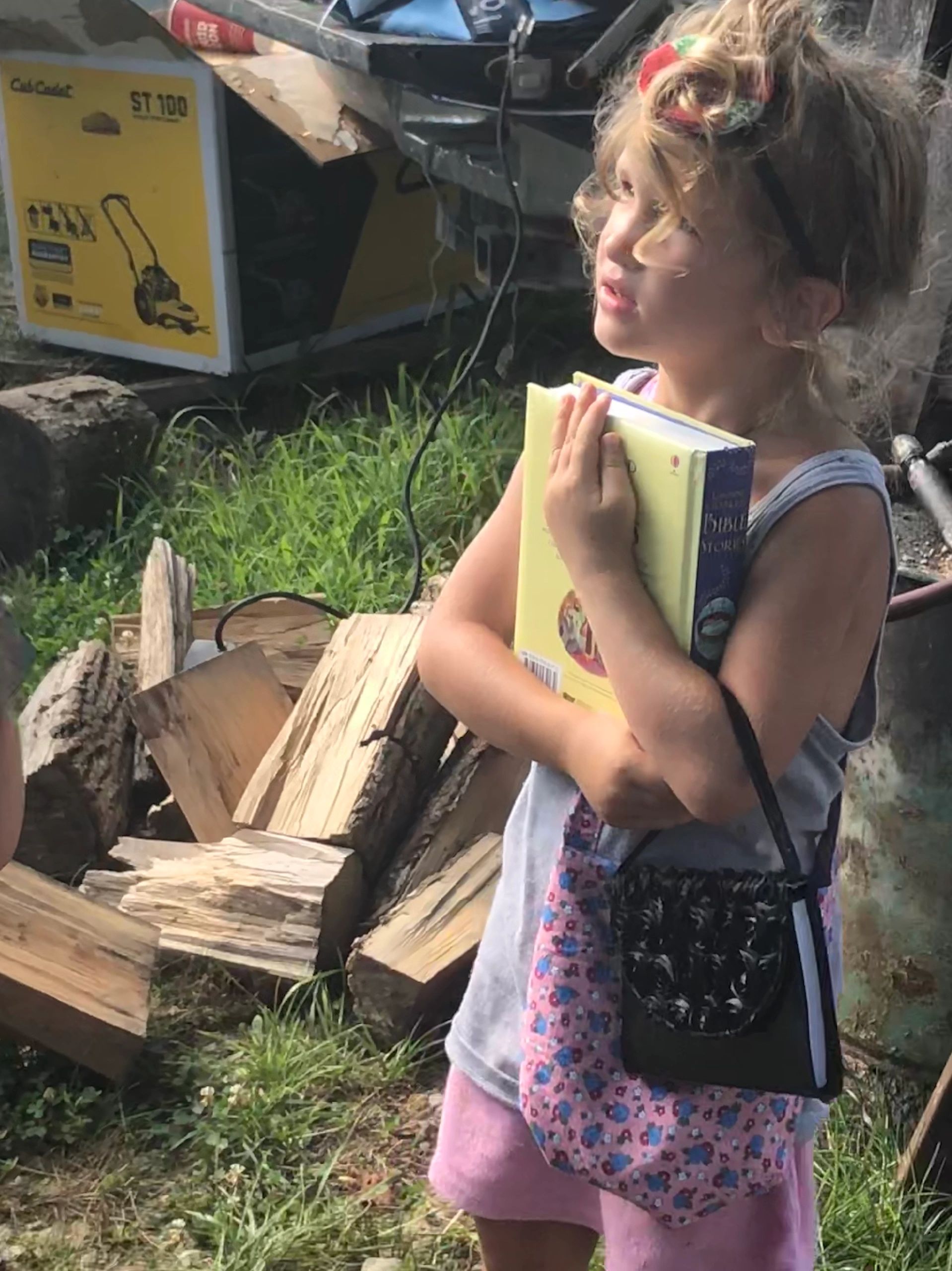 A little girl with book