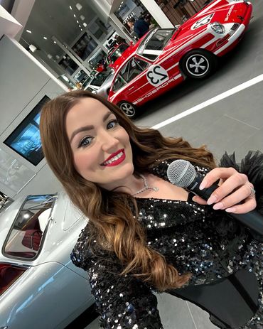 Jazz singer Mimi Rose singing at an automotive event for Porsche