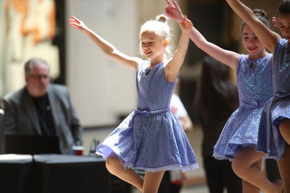 DJ Bernie Howard acting as the MC for the DancED recital at Northbrook Court