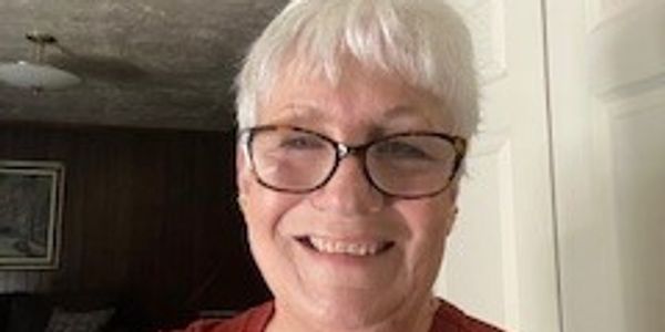 a woman looking at camera