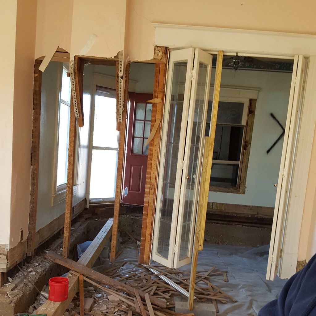 Sometimes the work is messy. We took out this wall of lath and plaster to make a larger living room.