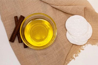 Cold pressed oil and raw ingredients and filters on table