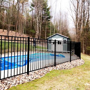 Custom-tailored fencing, vinyl, gates, and rails with a Landscaping and Design plan by Yardwolves