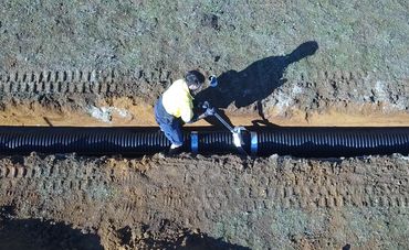 Securing underground pipe system connection