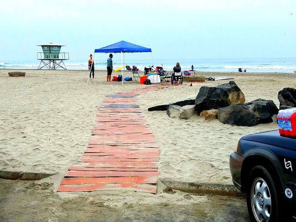 Original wheelchair pathway before we got the AccessTrax. These were vinyl flooring linked together.