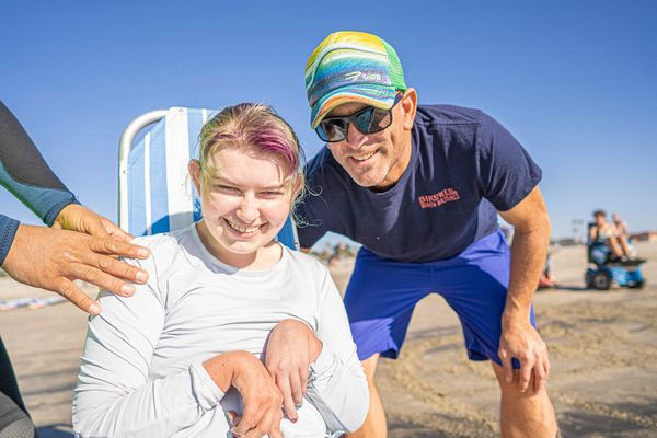 Riley and Drew hanging out on the beach in the water wheels.