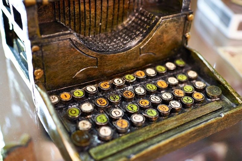 Vintage typewriter carved out of wood.