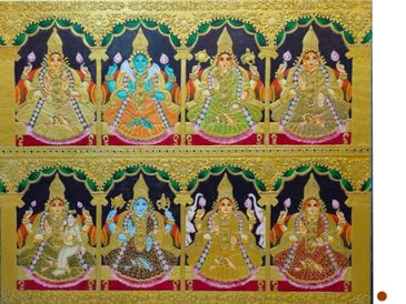 Traditional Indian Tanjore painting depicting Hindu deities with intricate gold detailing.