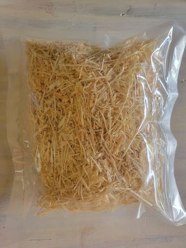 Bag of vacuum-sealed sawdust and wood shavings for DIY Firestarters or Dry pack Fire Tinder. Lightwe
