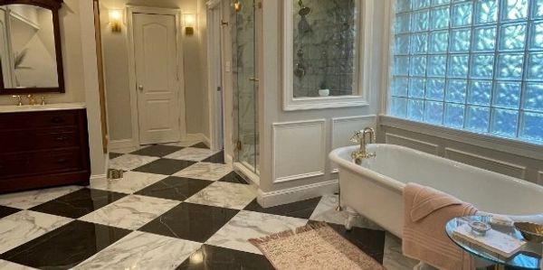 Forehand Construction Group Bathroom Remodel featuring a Soaker Tub and Walk-in Tile Shower