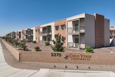 Exterior view of Cielo Verde Apartments on a sunny day.