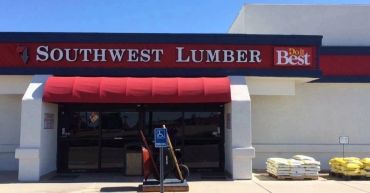 Southwest Lumber store entrance with a red awning.