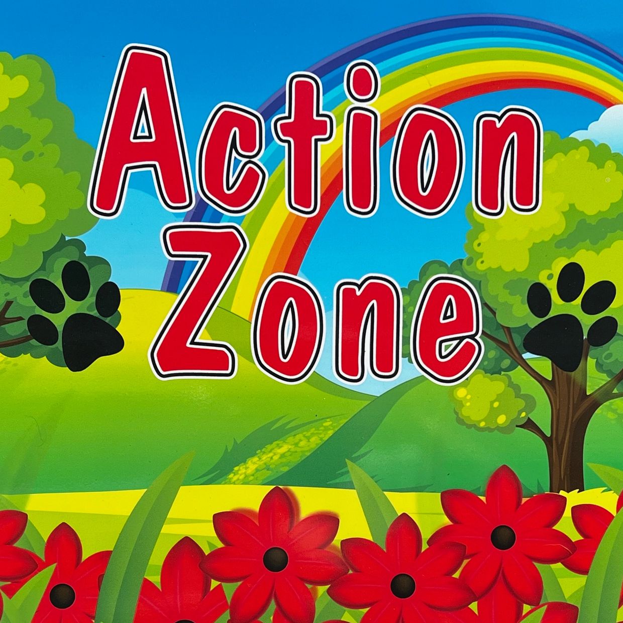 Action Zone Sign - with blue sky with rainbow, grass covered hills with trees, red flowers