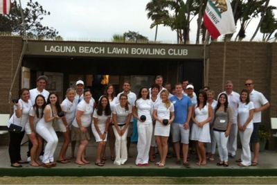 Photo of private party participants in front of the clubhouse entrance.