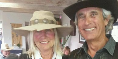 2 smiling members in the clubhouse.