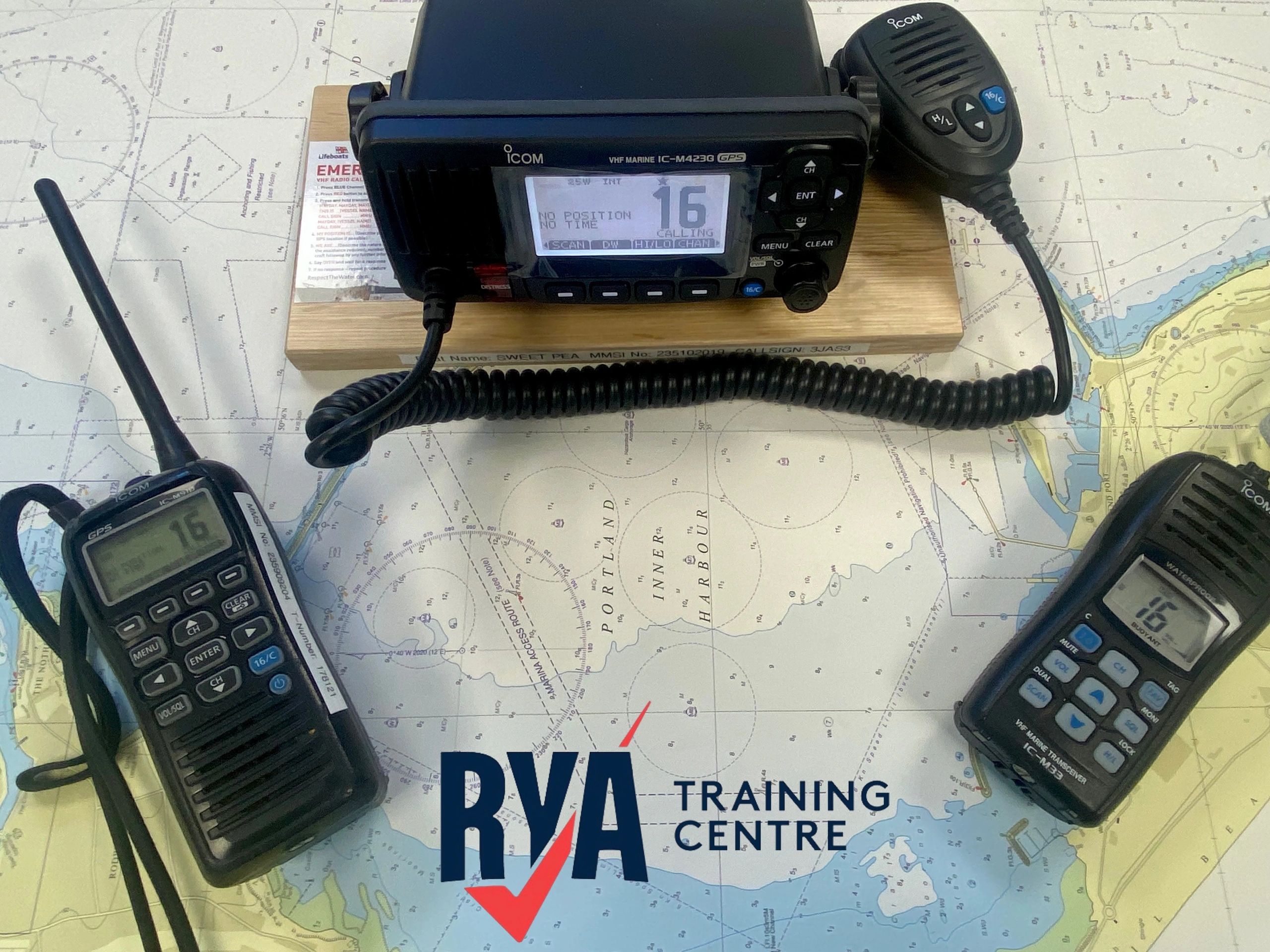 Marine radio devices on a navigation map at RYA Training Centre.
