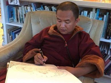 A senior artist sketching Zambala, god of wealth.
