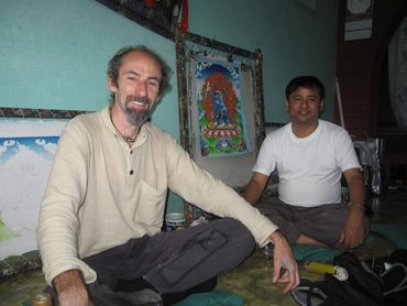 An Italian student learning to paint a Buddha Thangka at Thamel workshop.