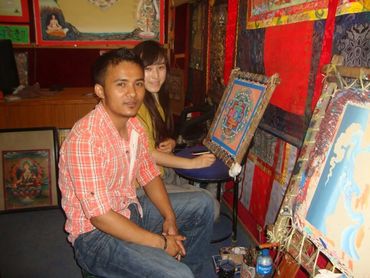 Chinese student learning to paint a Mandala at Thamel workshop.