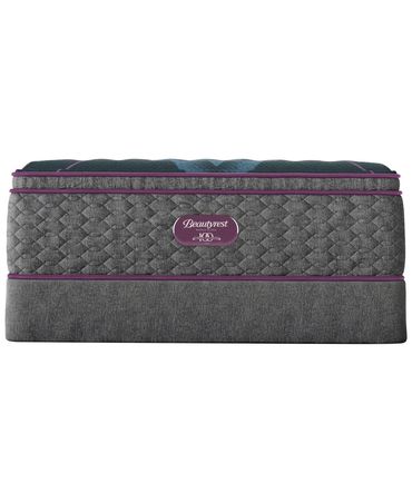 Gray Beautyrest mattress with purple accents on a white background.