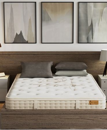 Modern bedroom with a wooden bed frame, abstract art, and neutral decor.