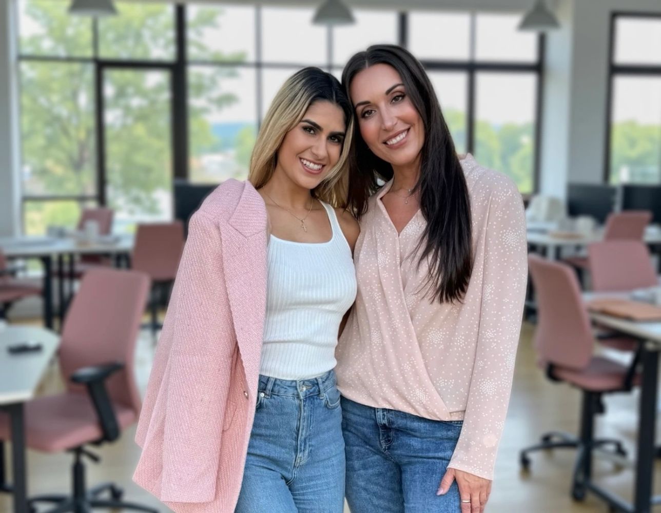 Angela and Anjeli of Her POV in a modern office, reflecting confidence, friendship, and ambition.