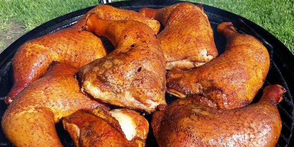 Chicken cooking on smoker.