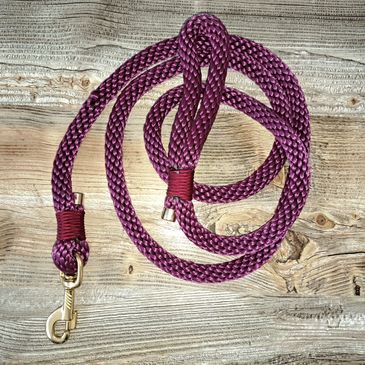 Rich plum-toned rope, with refined gold hardware- where elegance meets all-day durability.
