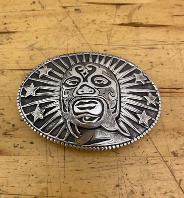 silver carved luchador trophy buckle