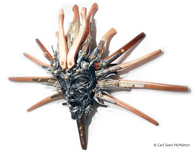 Sculptural mask Nexus III with curved oak and steel form, shown from front left perspective