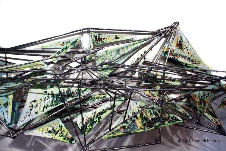 Mixed media sculpture blending metal and canvas, inspired by Lower Mainland's layered terrain