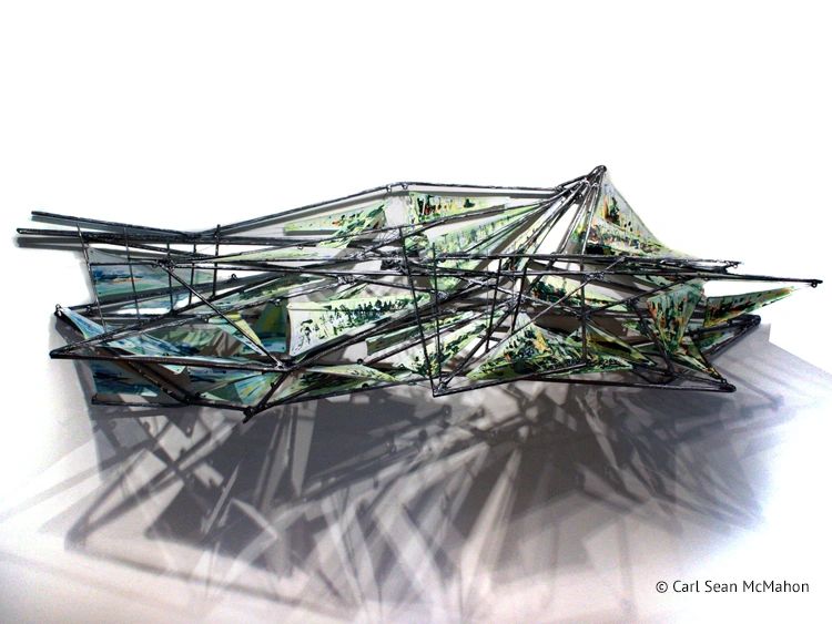 Abstract sculpture with painted canvas and metal forms, evoking subtle Lower Mainland landscapes