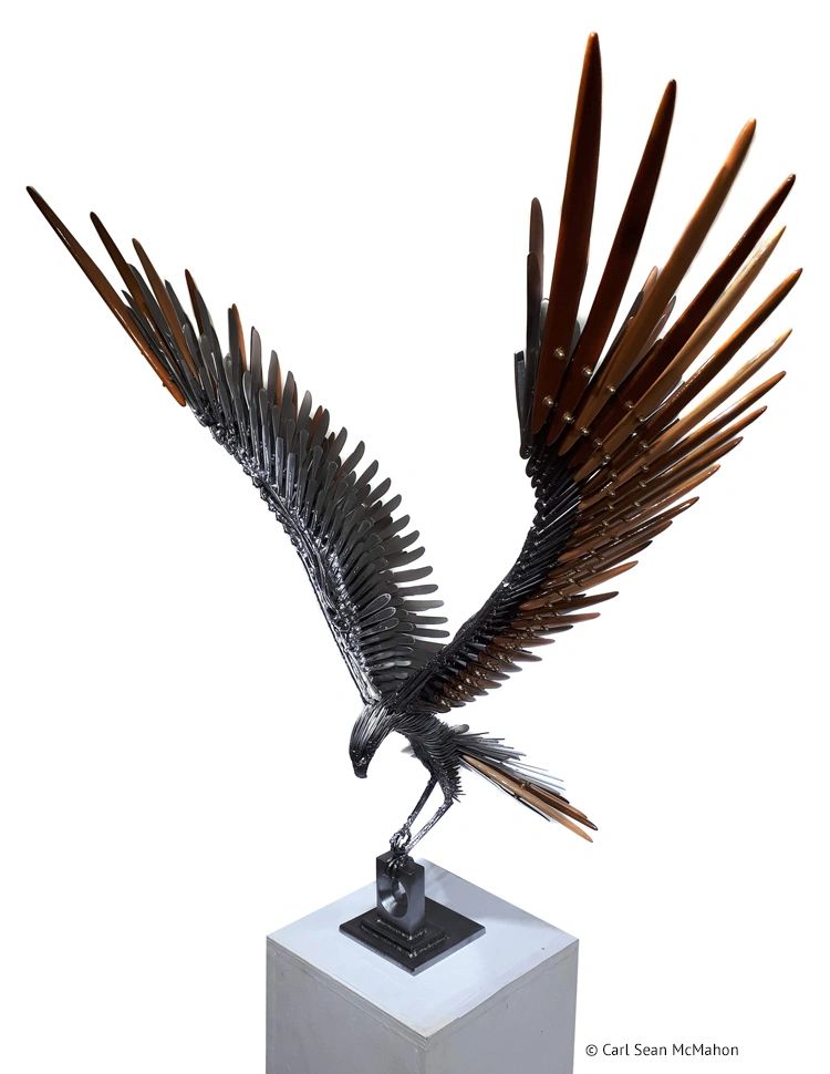 Osprey XVI sculpture with reclaimed cedar details and crossed talons atop hollow rectangular base