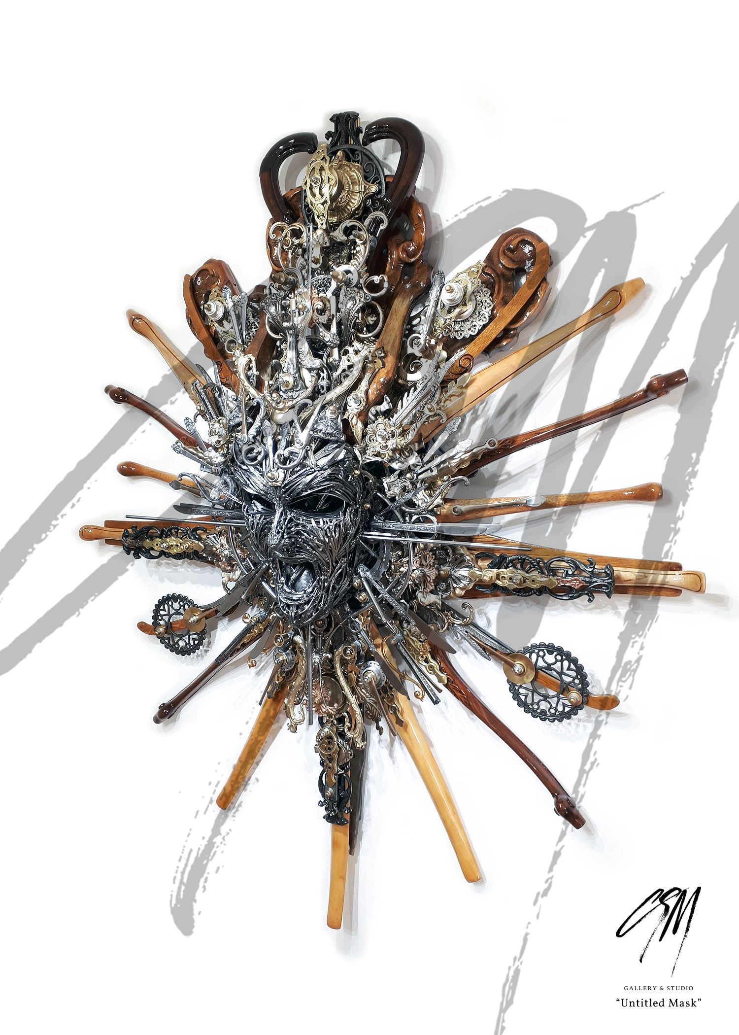 Front left view of Untitled Mask with carved wood outcrops and layered brass and aluminum elements