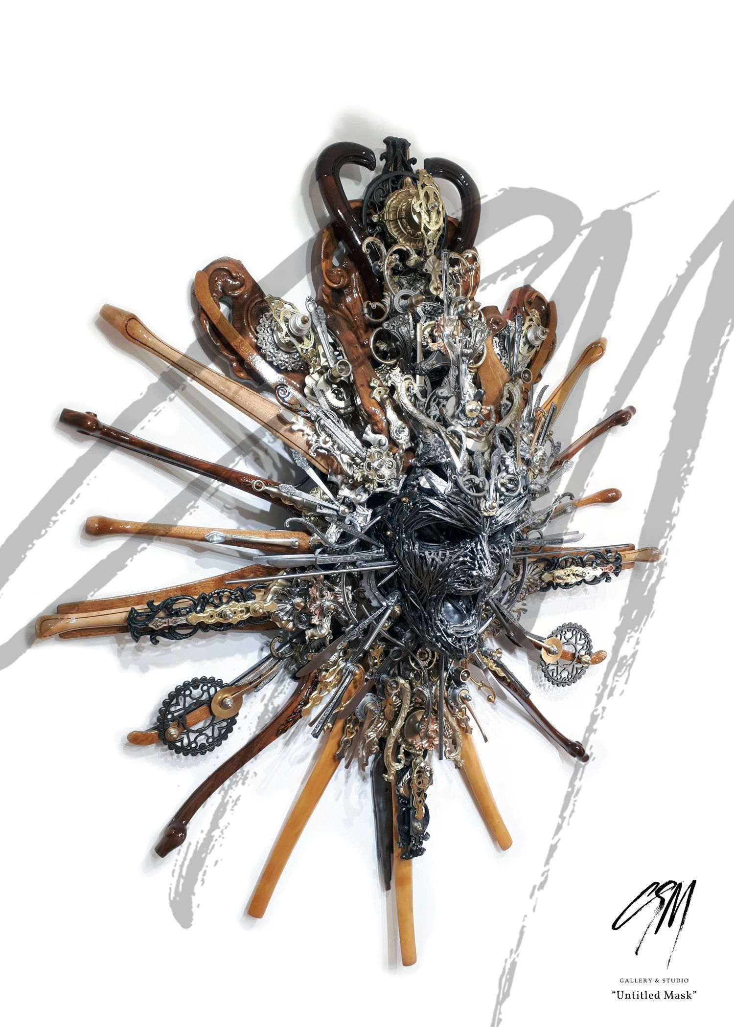 Right view of Untitled Mask with carved hardwood outcrops, ornate brass and aluminum metal details