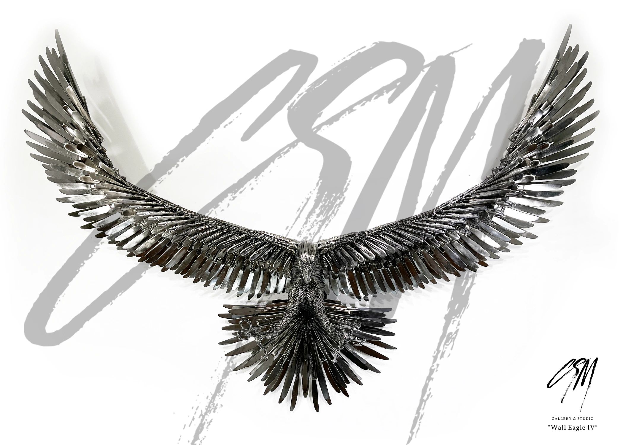 Frontal view of wall-mounted eagle sculpture with outstretched wings in reclaimed metal.