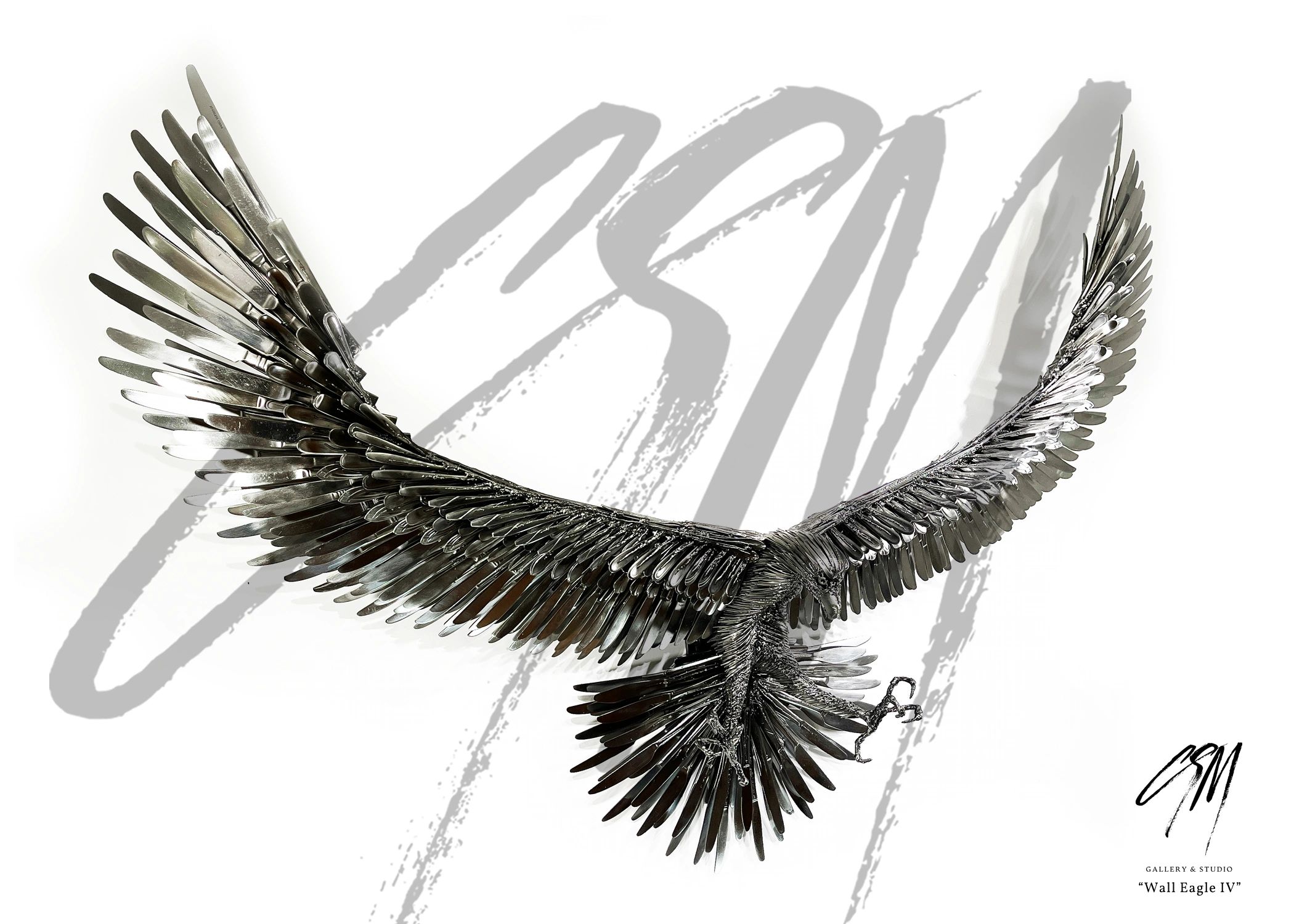 Wall-mounted eagle sculpture with wings spread, front-right view in reclaimed metal with fine detail