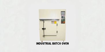 Industrial standard batch oven with control panel and secure door.