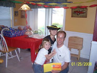 Hannah and Justin with their Daddy on his birthday in 2008