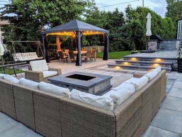 techo bloc patio with fire pit and outdoor kitchen in kirkland 