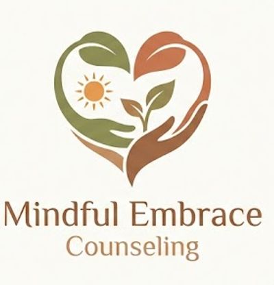 Logo of Mindful Embrace Counseling with hands, leaves, and sun in heart shape.