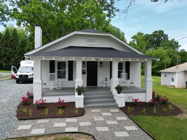 Residential home with lush landscaping and leveled grading