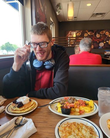 Blueberry pancakes make me smile.