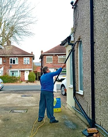 Water-fed pole window cleaning on residential property in Ruislip.